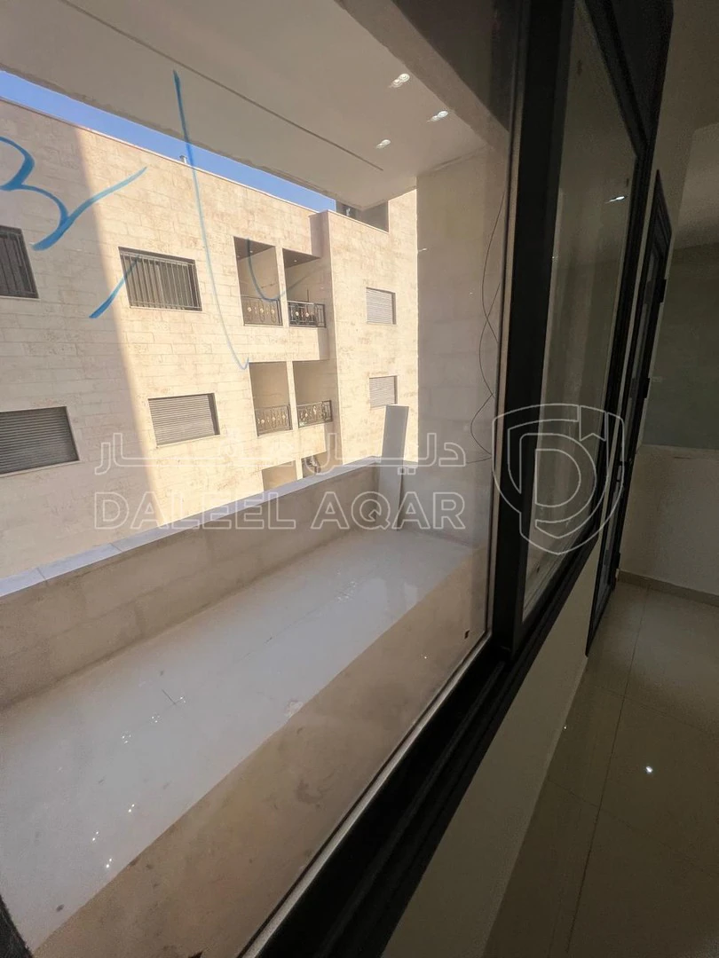 شقة في ابو نصير قرب مسجد الانصار - 68,000 دأ - صورة 1